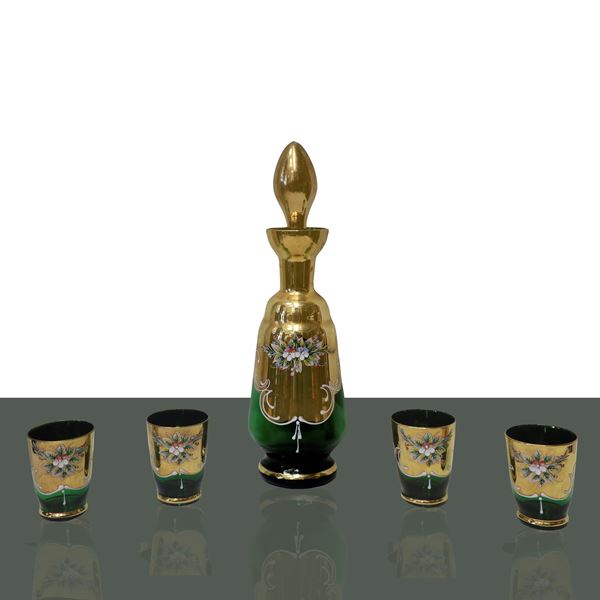 Rosolio bottle in golden glass