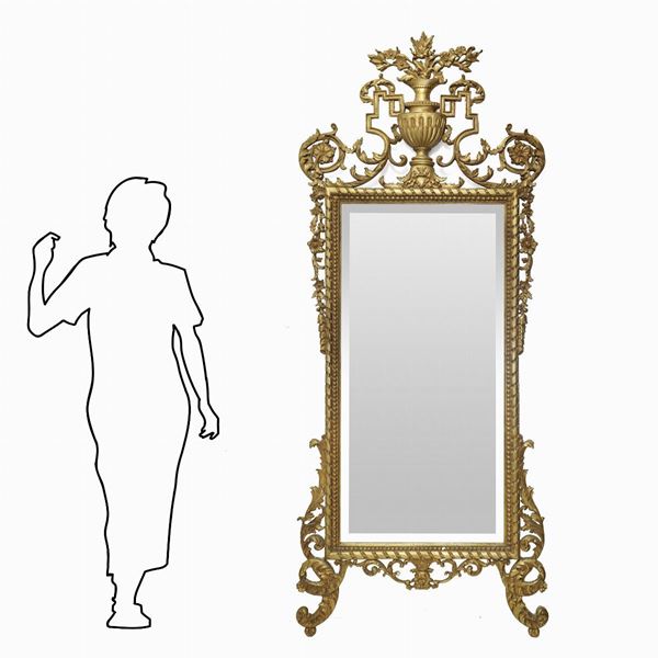 Mirror in carved gilded wood