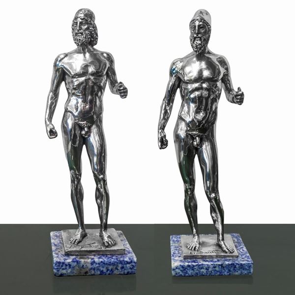 Two figures portraying the Riace bronzes, in silver bath, sculptor A. Santini.