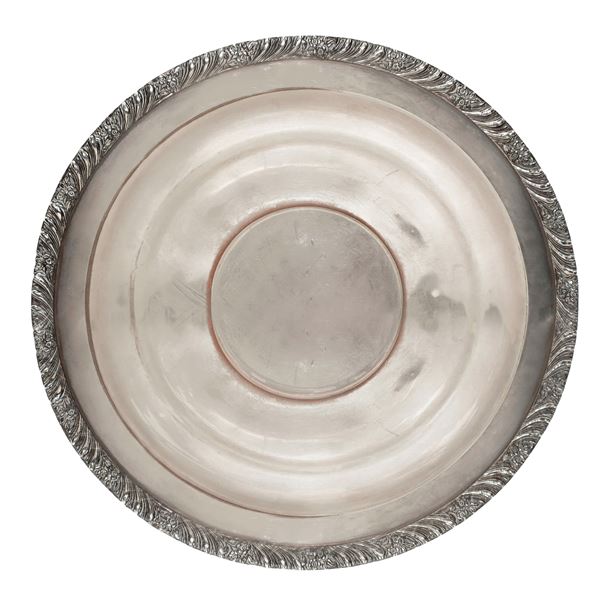 Centerpiece plate in silver, double layered border decorated with floral motifs