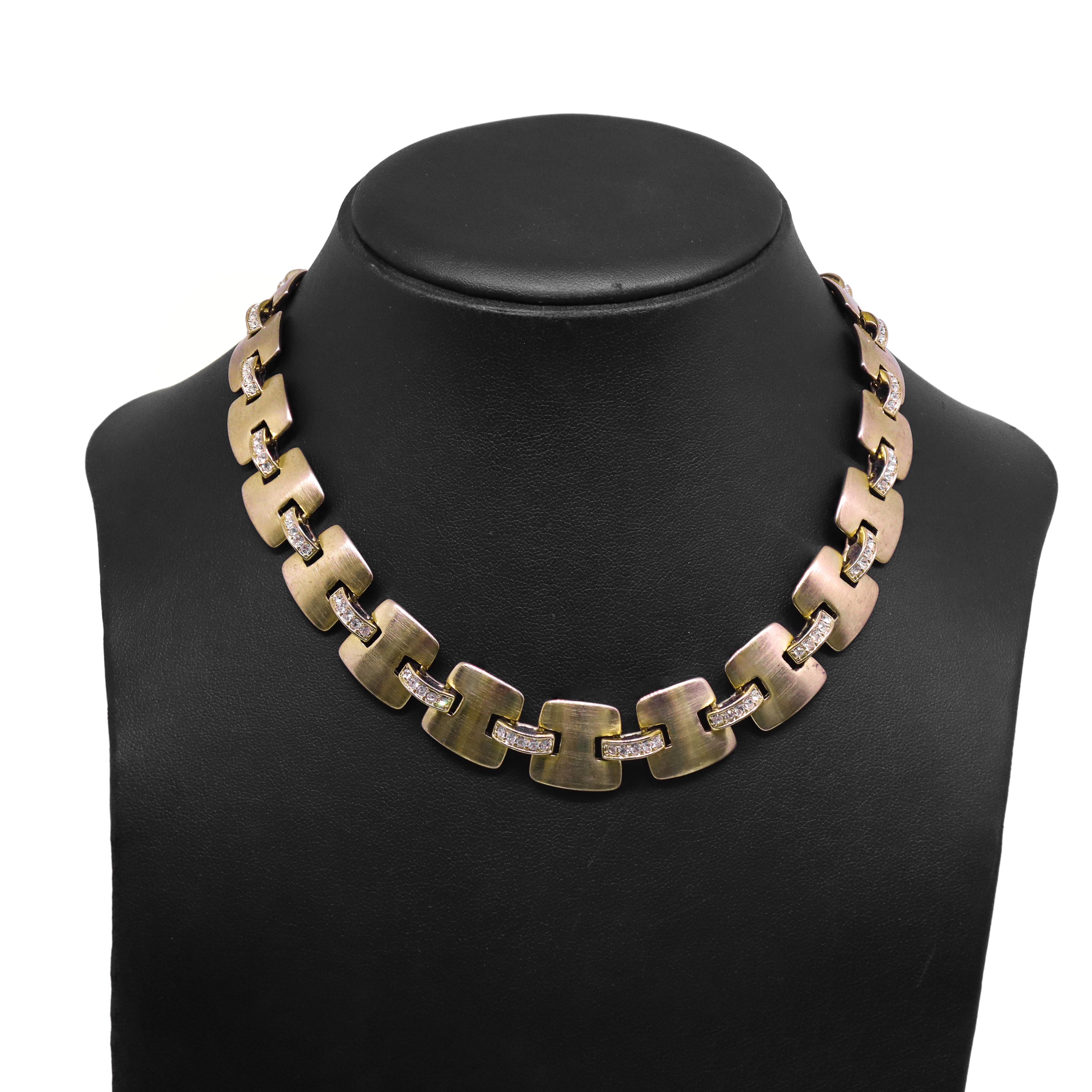 Girocollo in metallo dorato e strass, Monet