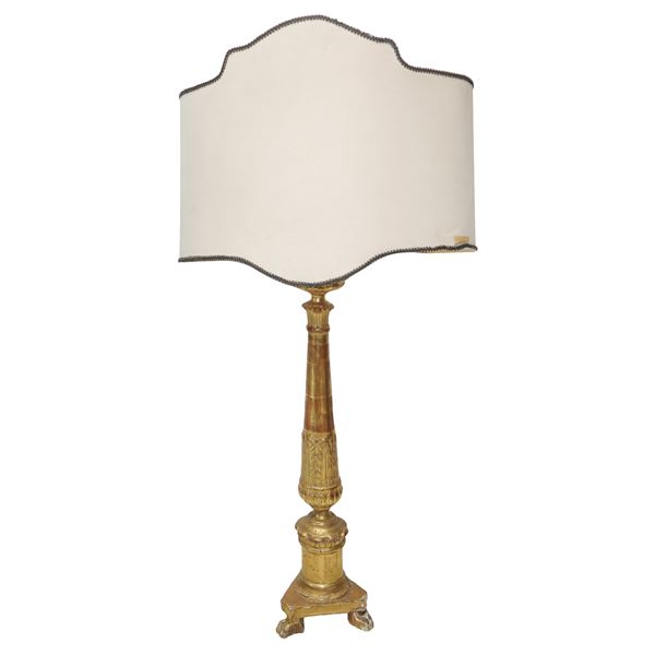 Golden wooden candlestick with fan