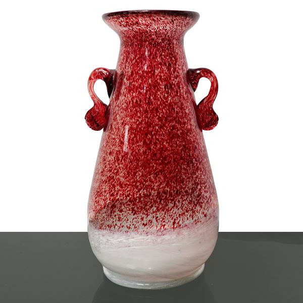 Two-handled glass vase in shades of red