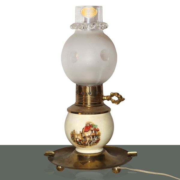 Small electric lamp with metal ashtray base