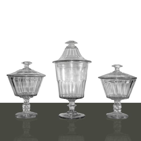 Triptych composed of a pair of cut crystal vases