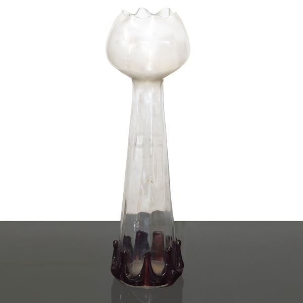 Clear glass vase with amethyst colored base