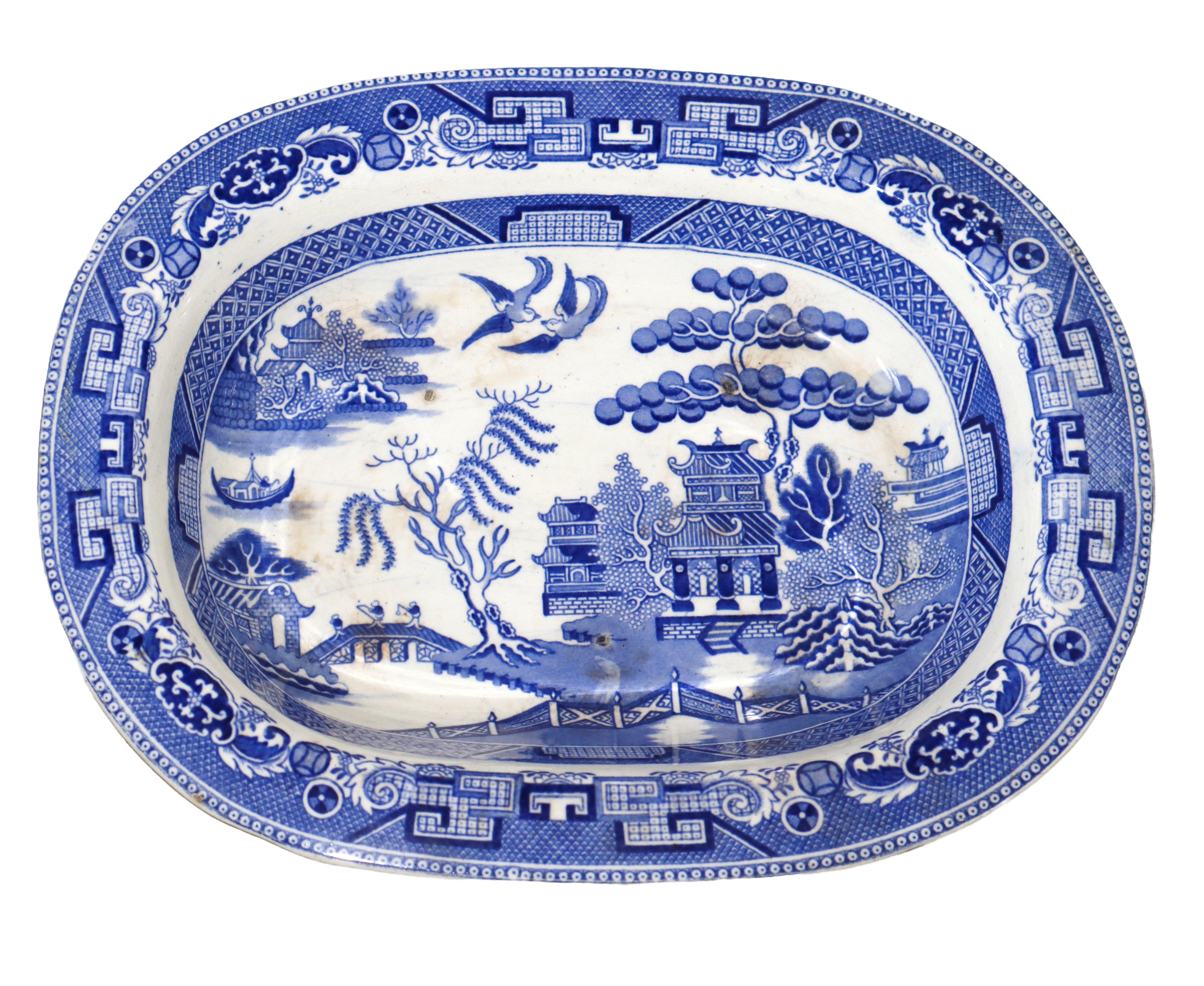 Due piatti fondi ovali e due potiches con disegni orientali