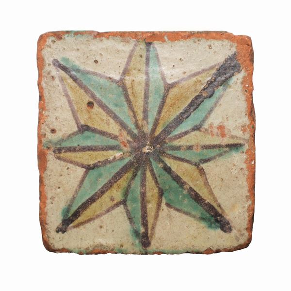 Caltagirone majolica tile depicting compass rose