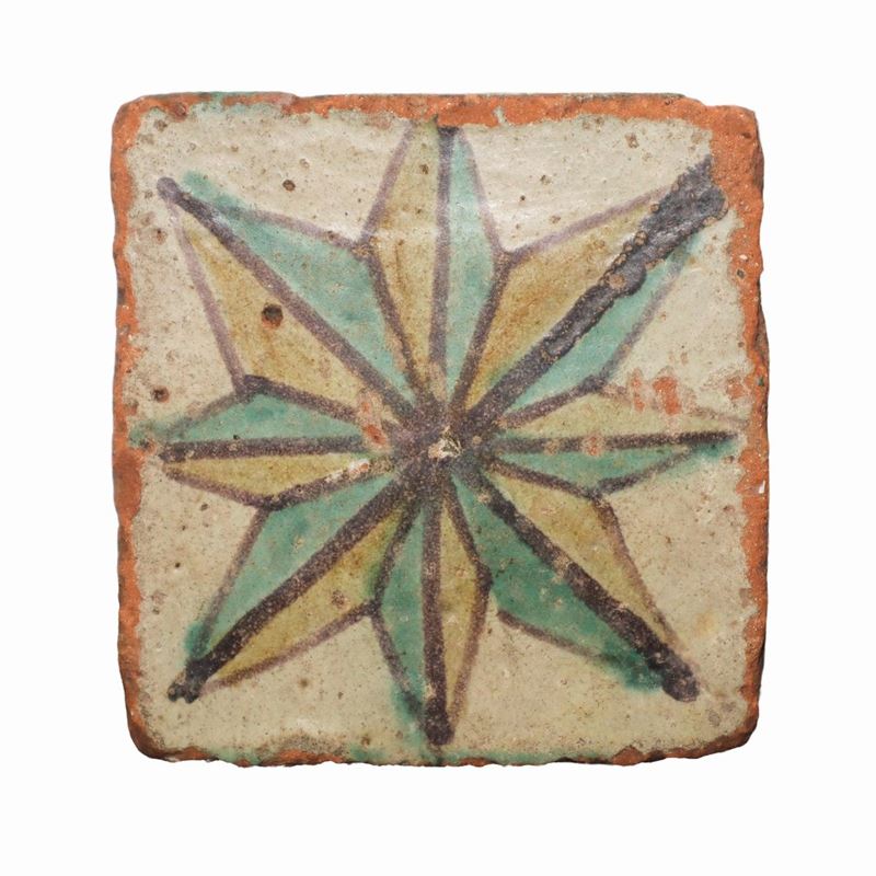 Maiolica di Caltagirone, Tozzetto raffigurante rosa dei venti