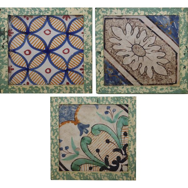 Wall composition, triptych of tiles in a frame