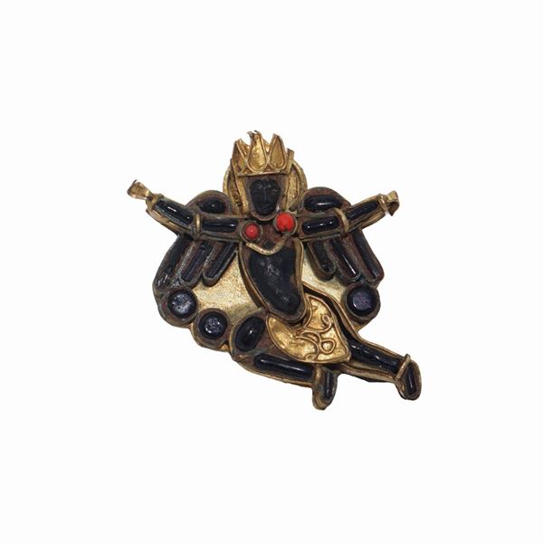 Brooch depicting Goddess in brass, onyx and corals