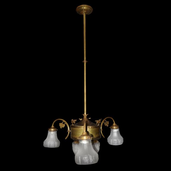 Liberty chandelier with three arms in gilded brass.