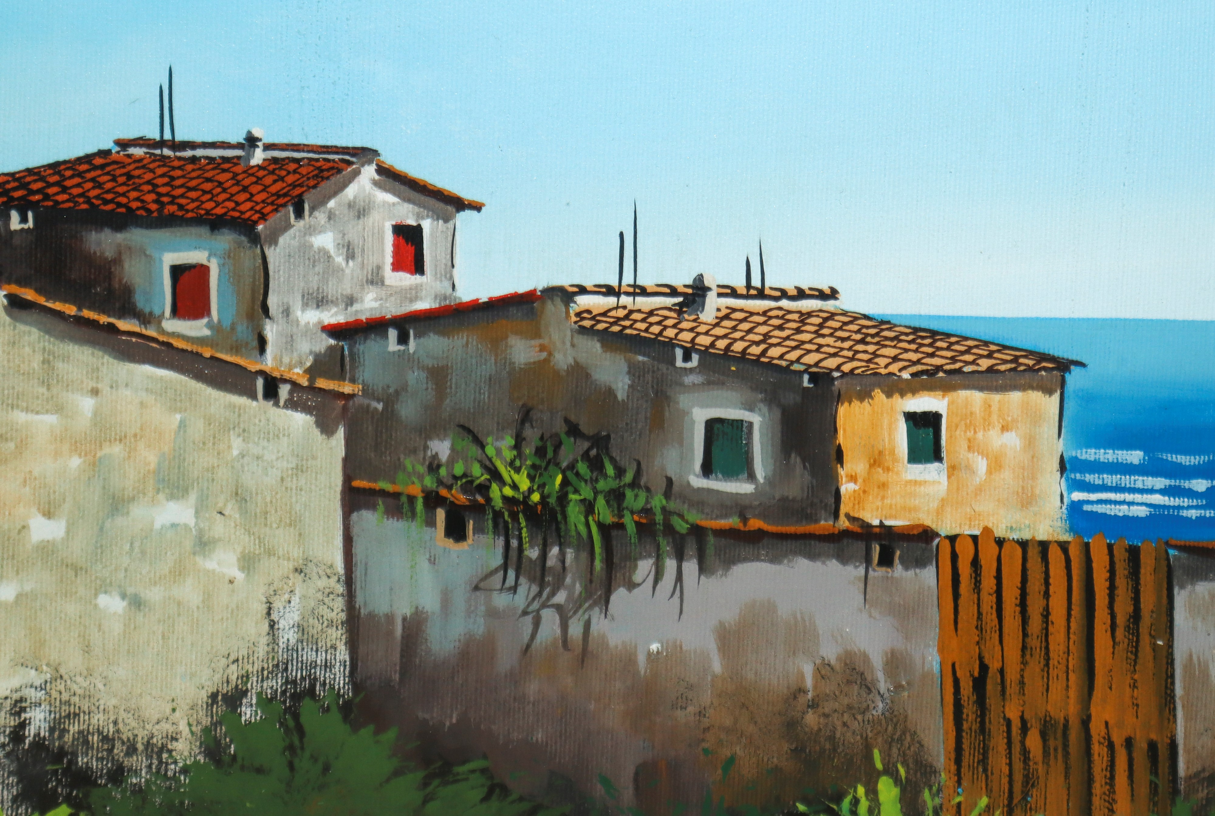 Paesaggio di case con marina