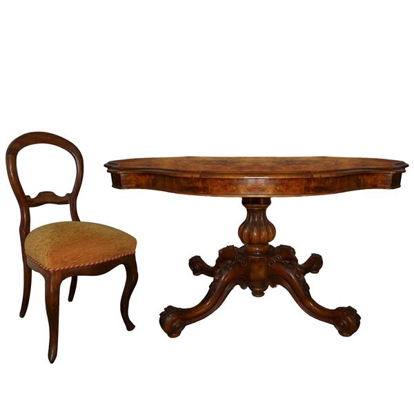 Oval biscuit-shaped table in walnut root with 6 chairs