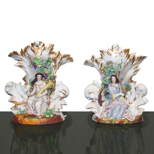 Pair of polychrome porcelain and gold vases