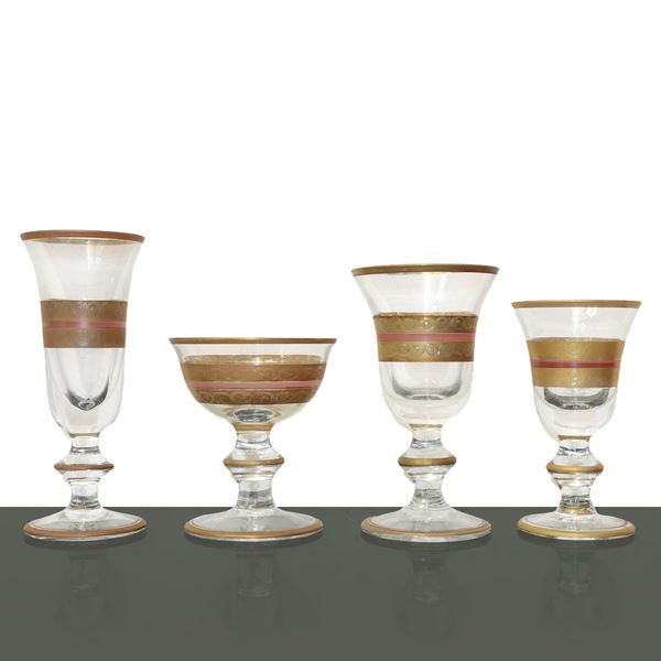 Servizio di bicchieri da 12 in vetro di Murano con dettaglio in oro e rosa.