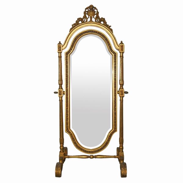 Specchiera basculante sagomata in legno dorato