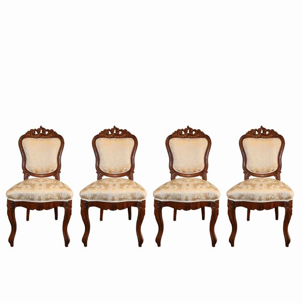 Group of 4 mahogany chairs, with carved and sculpted backrests
