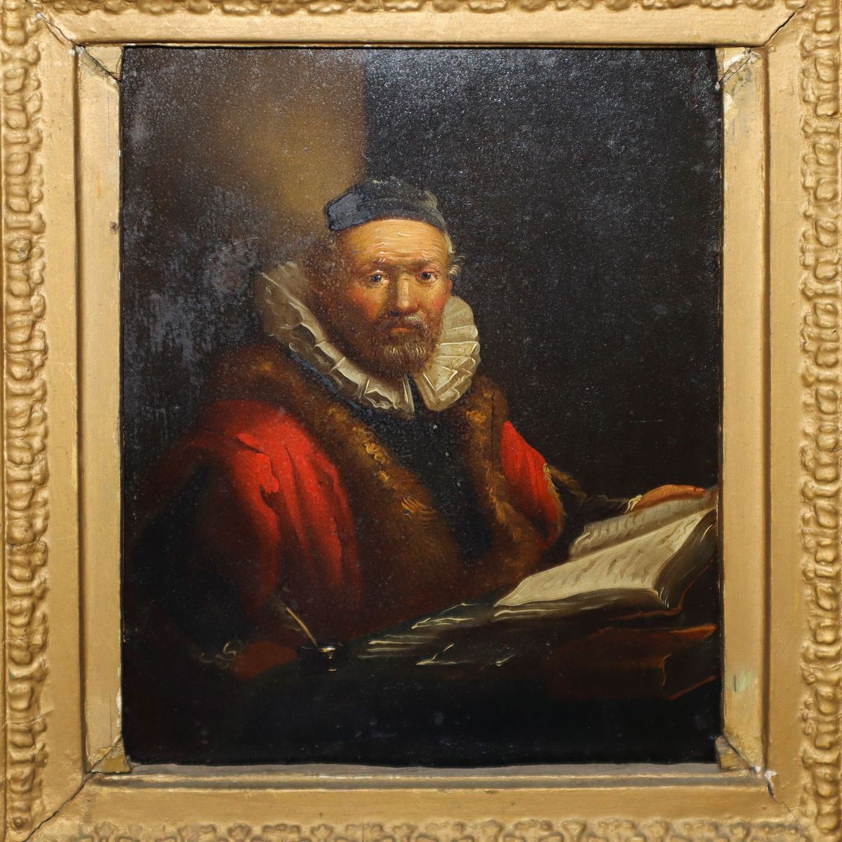 Uomo con Gorgera e Libro