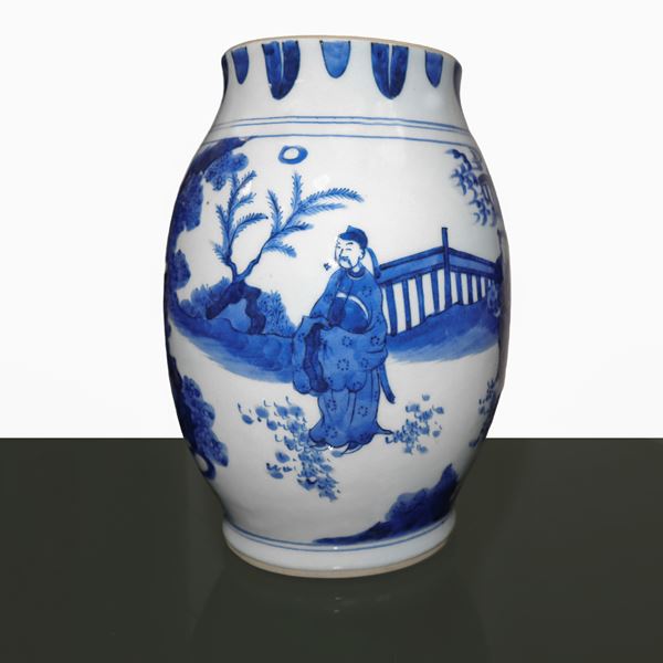 Vase in shades of white and blue with genre scenes and landscape with waterfall