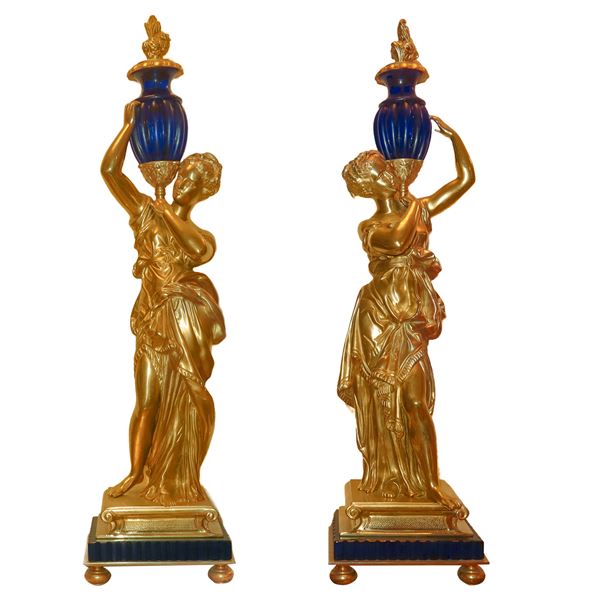 Pair of gilded bronzes with vase holder nymphs