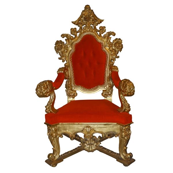 Large baroque style throne in gilded wood
