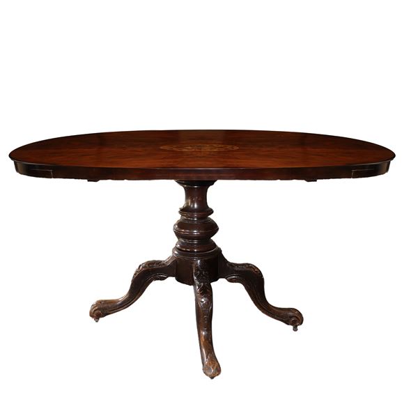 Tavolo ovale da centro in legno di palissandro, piede a quattro razze.