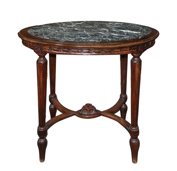 Coffee table with dark gray marble top flecked with white