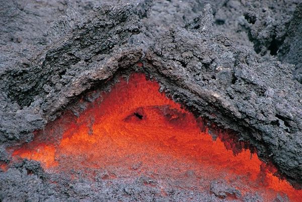 Collection EM, titled "Delta", the year 2000 Etna eruption in 2000, lava crust folded by gas bubble, fluid lava inside, slide 1/8, 50x74,5, cibachrome slide by direct printing, forex white 10mm