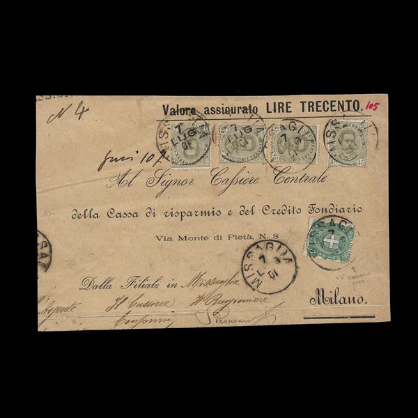 Grande frammento di assicurata per lire trecento viaggiata da Missaglia (LE) a Milano il 7/7/1901. Affrancatura bicolore con il 45 c. umbertino (n.63) e il 5 c. (n.67) dell'emissione successiva, per un totale di cinque francobolli. Da esaminare.