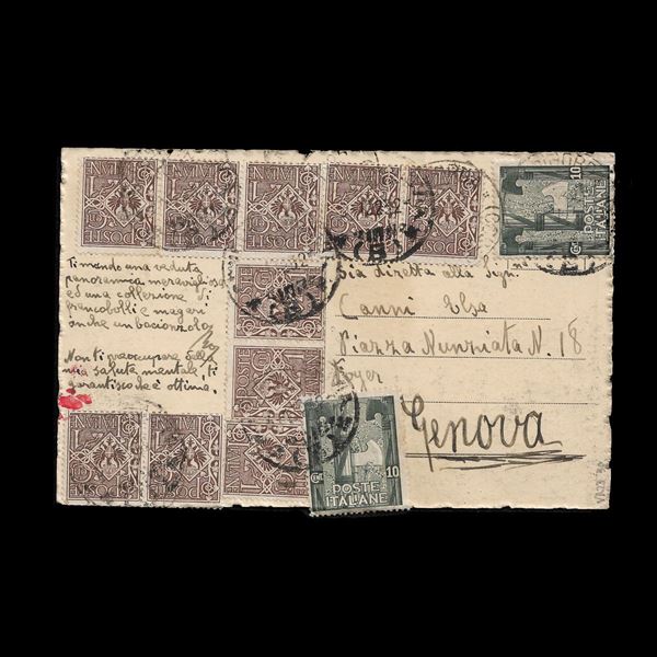 Cartolina in tariffa per l'interno affrancata con due esemplari del 10 c. Marcia su Roma (n.141) e ben dieci dell'1 c. Floreale bruno (n.68), ormai in rarefazione. Difficile uso tardivo e spettacolare combinazione.