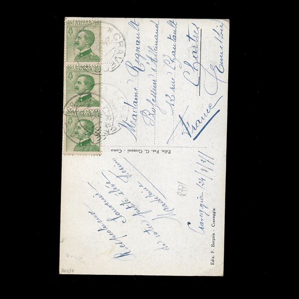 Striscia di tre del 25 c. Michetti verde (n.219) su cartolina illustrata in tariffa per estero, viaggiata il 24/9/1927 da Craveggia per Chartres (Francia). Non comune.