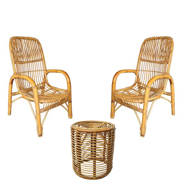 Pair of bamboo chairs with coffee table