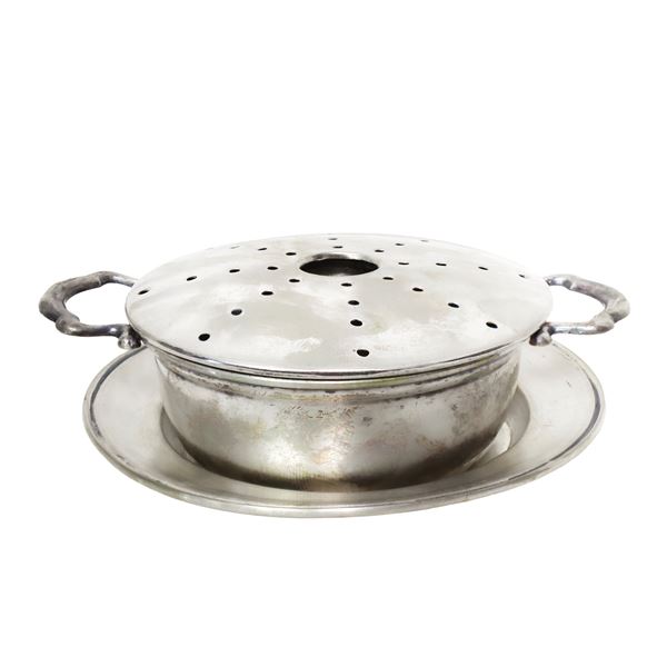 Small silver saucepan with handles and lid with holes and underlay