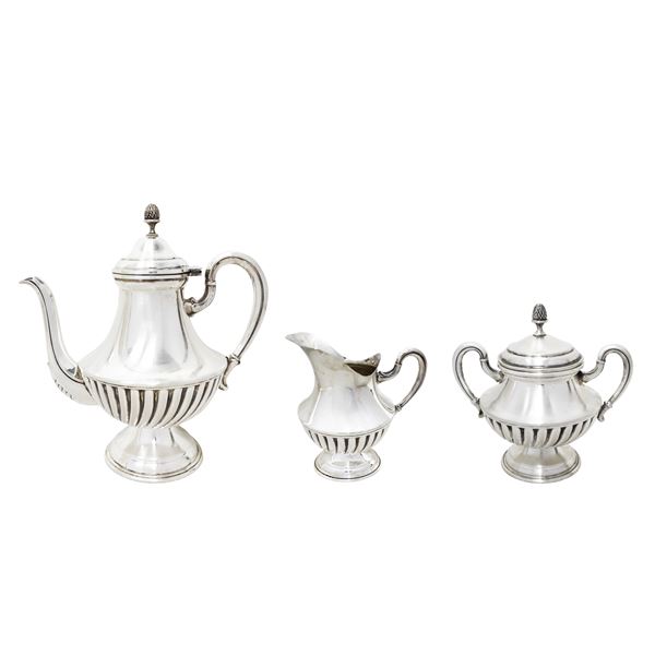 Silver service consisting of coffee pot, sugar bowl and milk jug