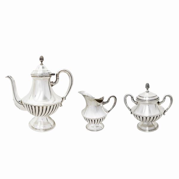 Silver service consisting of coffee pot, sugar bowl and milk jug