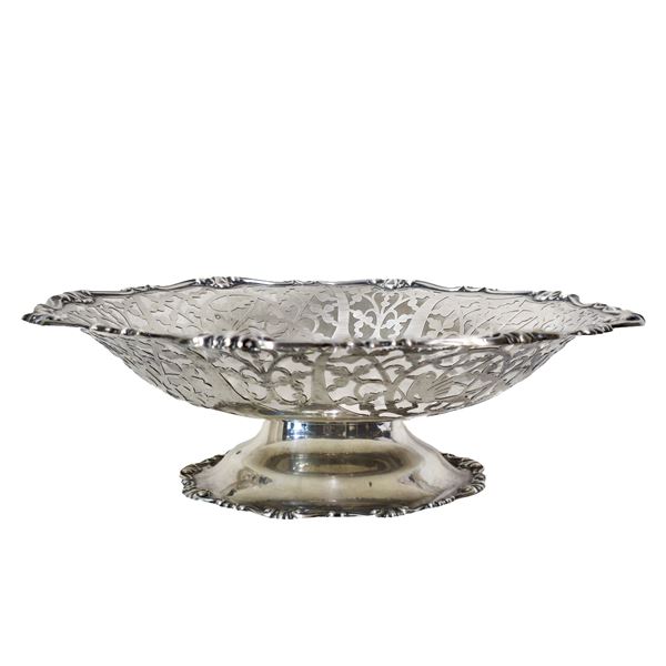 Silver stand with perforated and scalloped edge