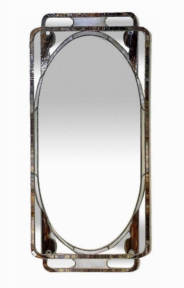 Specchiera a parete con lavorazione Tiffany con vetri colorescenti, stile Liberty. 
Cm 108x50