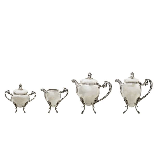 Silver service consisting of teapot, coffee pot, sugar bowl and milk jug