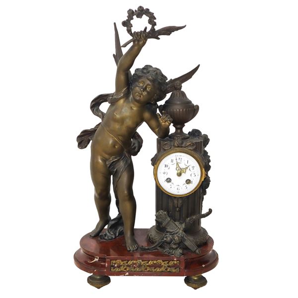 Orologio con putto in bronzo