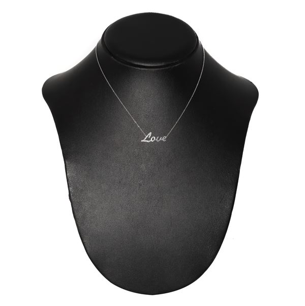 White gold necklace with Love writing with brilliant cut diamonds