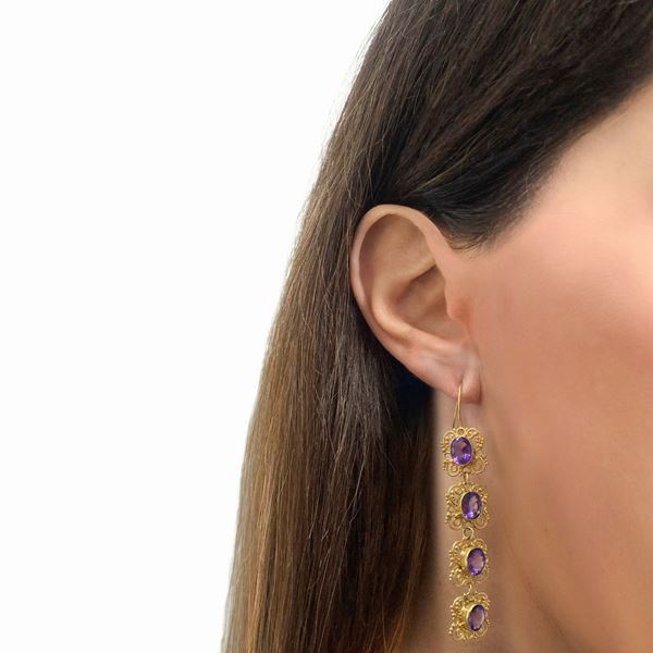 Gold pendant earrings with amethyst