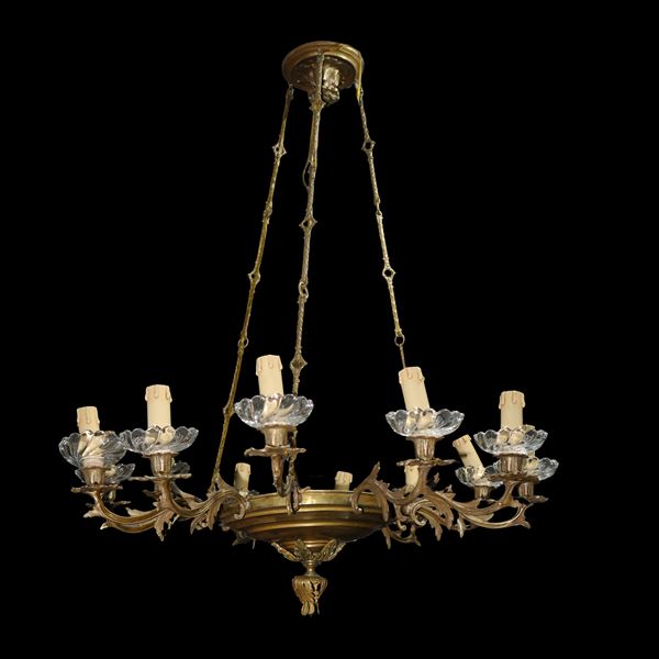 Chandelier with 12 lights in golden metal and glass saucers
