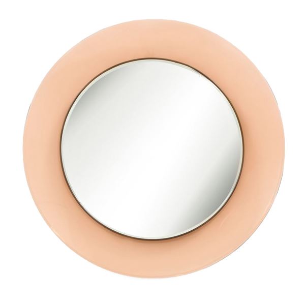Curved glass mirror in shades of bronze