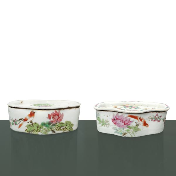Pair of Chinese porcelain incense holders, with floral decorations