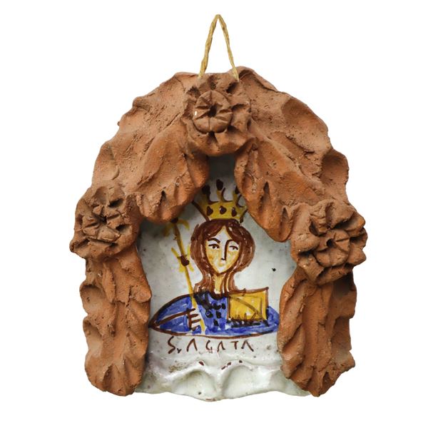 Raffigurazione di Sant'Agata in ceramica smaltata