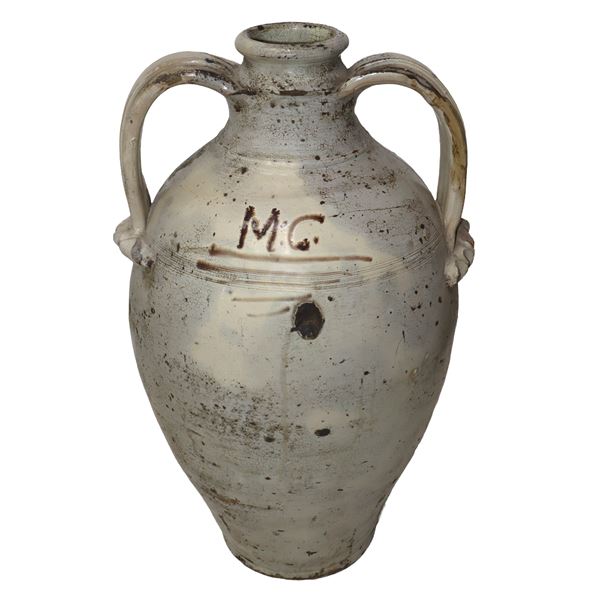 Quartara in maiolica di Catalgirone, smaltata e con manici.