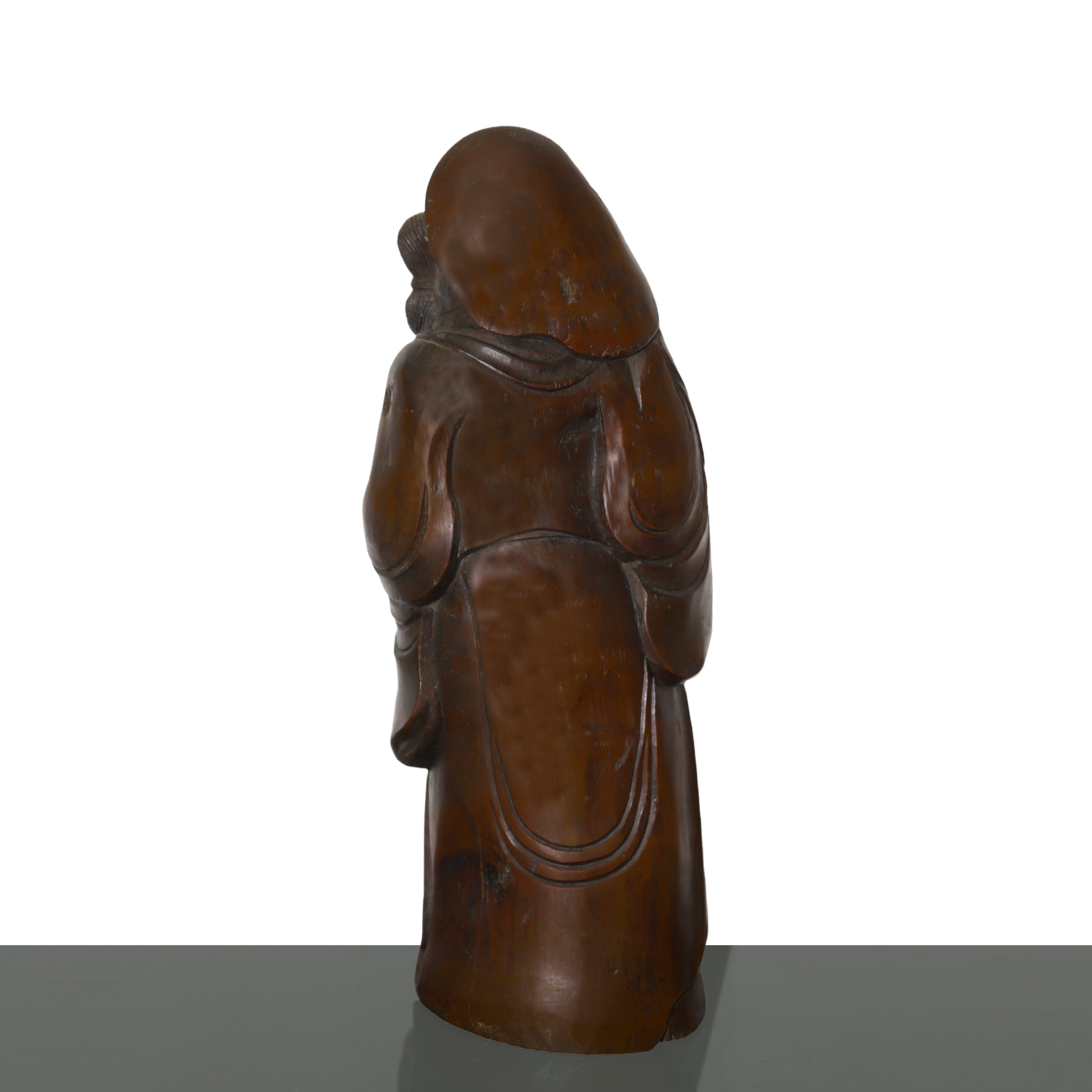 Coppia di sculture in legno di bamboo raffiguranti un uomo e una donna