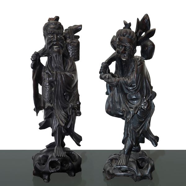 Pair of carved wooden figurines of the god Shoulao