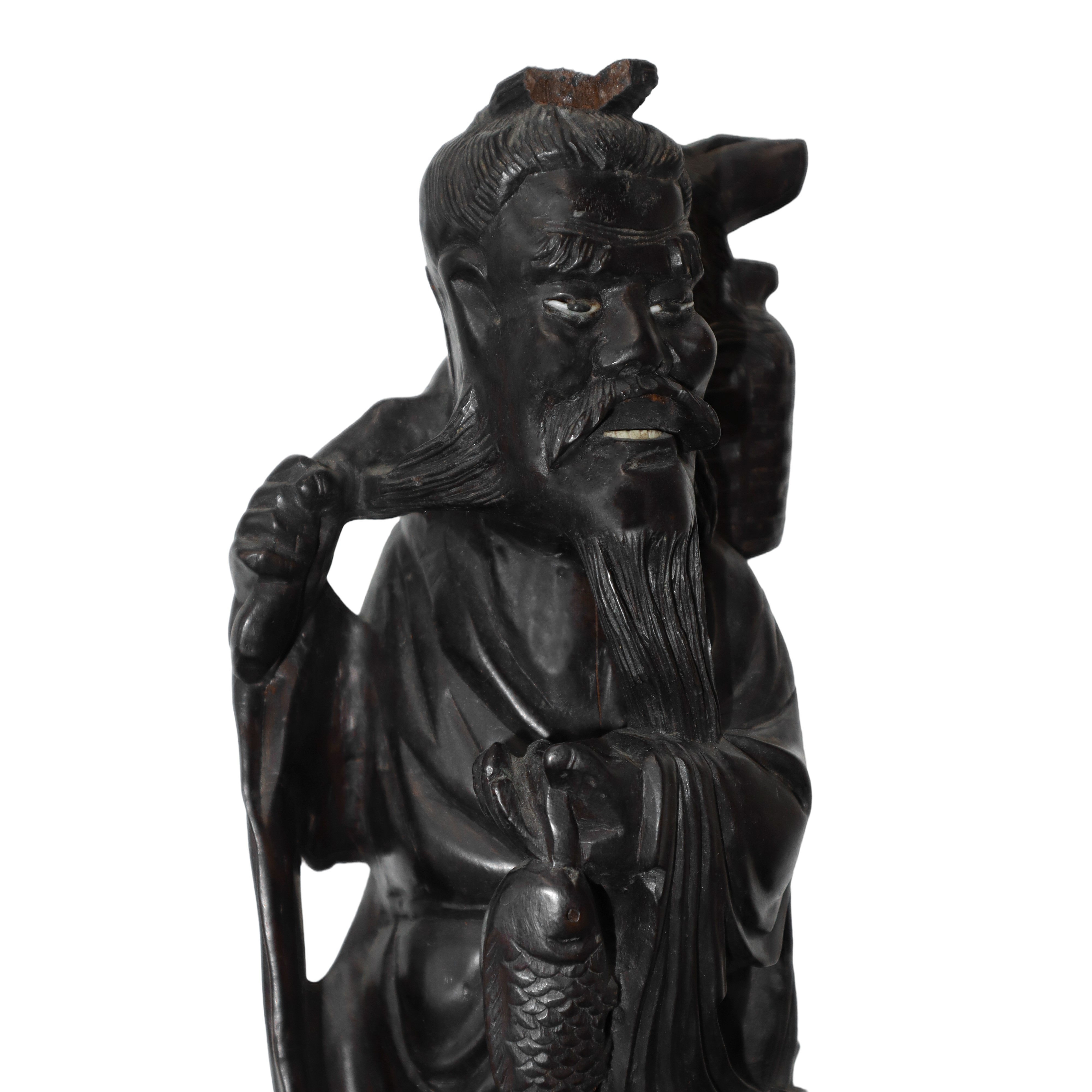 Coppia di statuine in legno intagliato del dio Shoulao